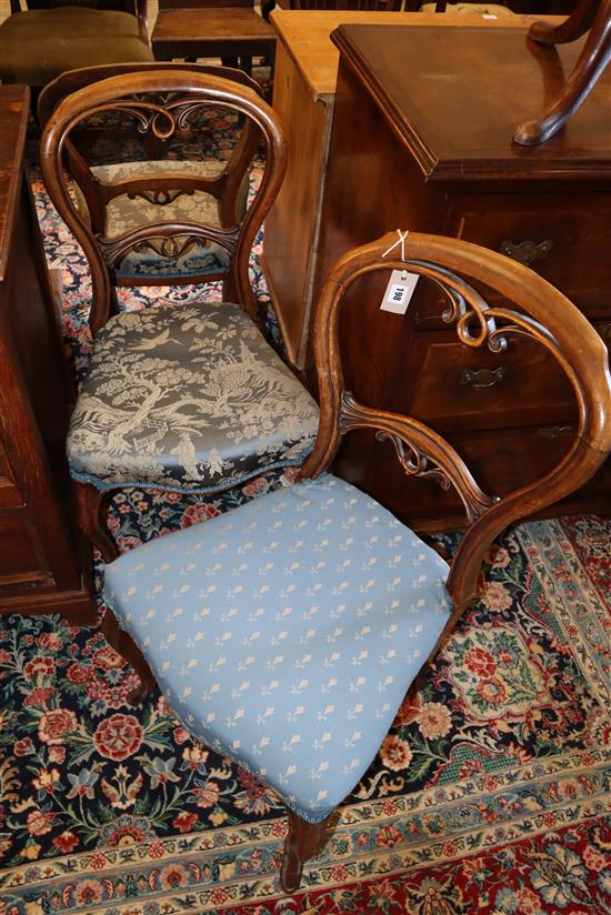 A set of three Victorian balloon back dining chairs